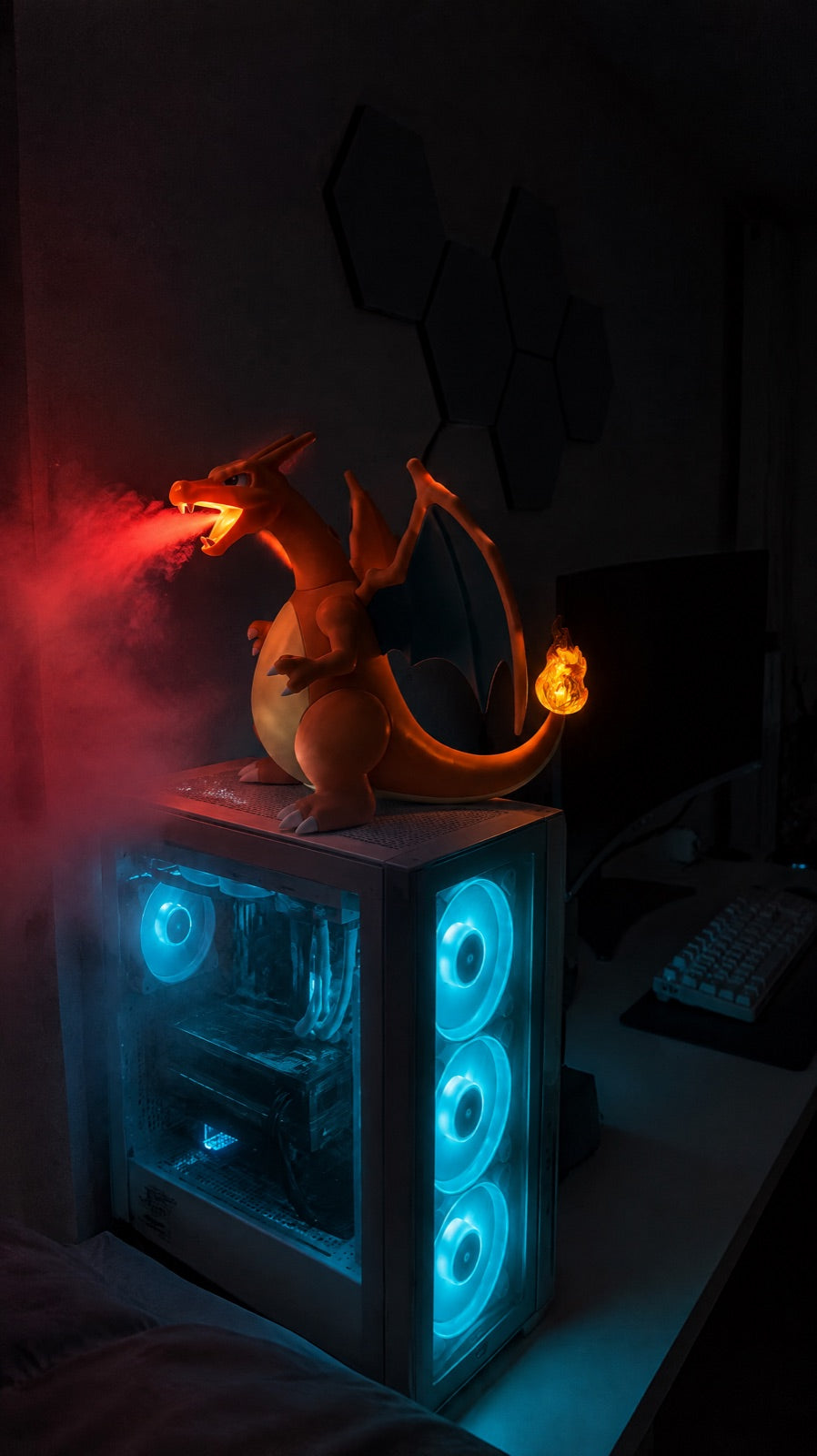 Fire-dragon mist humidifier on a gaming desk, breathing flame-lit mist.