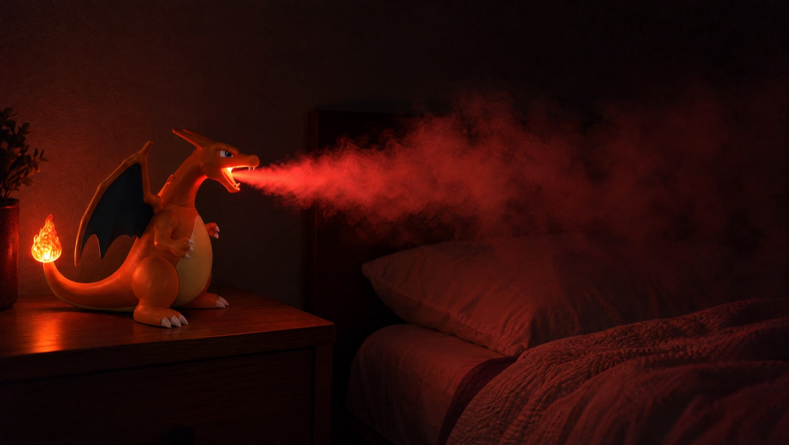 Fire-dragon mist humidifier on a nightstand, breathing flame-lit mist toward a bed in a dark room.